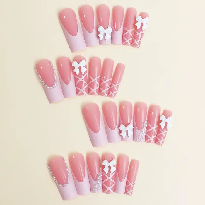 Faux ongles décoratifs avec nœud blanc