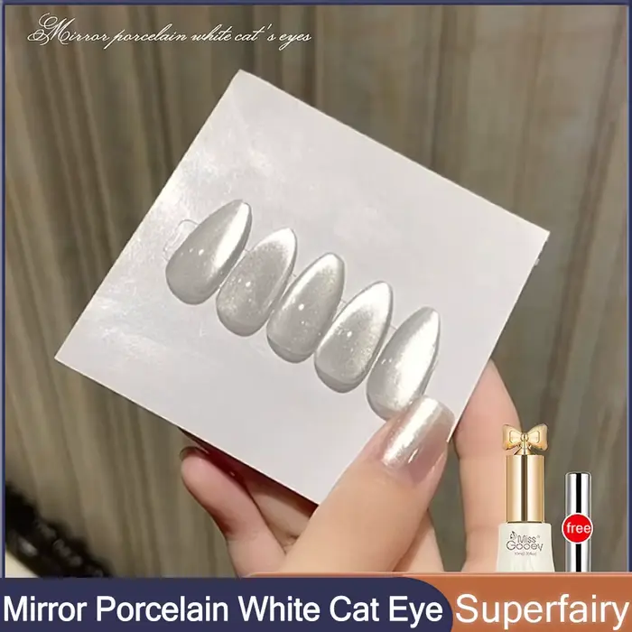 Verhéritage à ongles en gel œil de chat blanc