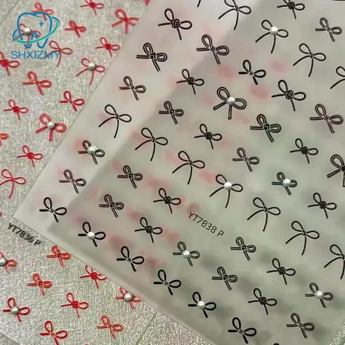 Autocollants pour ongles exquis en forme de mini-nœuds