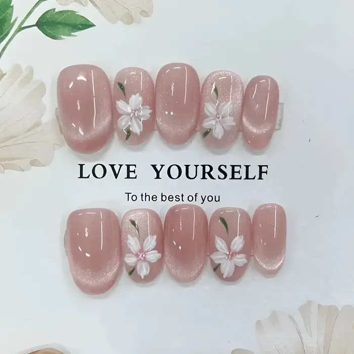 Faux ongles en forme d'oeil de chat rose peints à la main