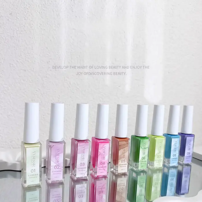 Macaron floraison vernis à ongles marbre encre