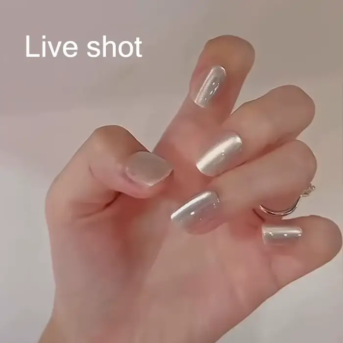 Verhéritage à ongles en gel œil de chat blanc