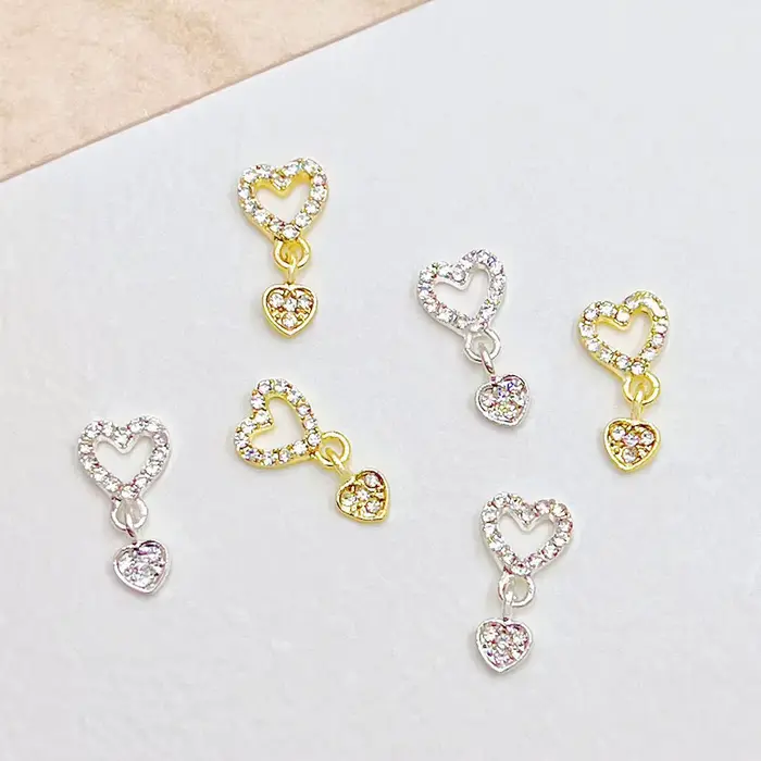 10 pièces coeur balancent ongles breloques 3D alliage luxe ongles strass argent or creux coeur ongle