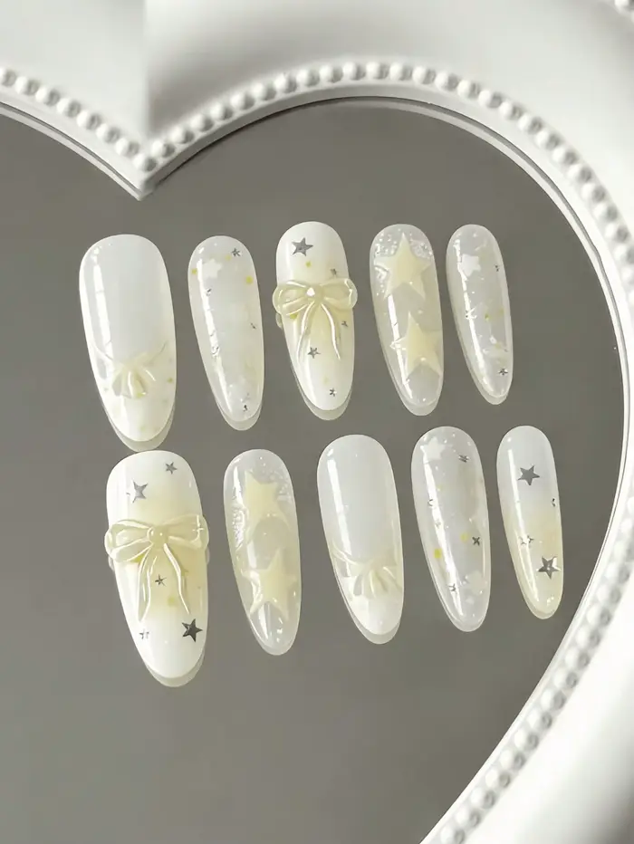 10 faux ongles transparents de longueur moyenne en forme d'amande, couleur jaune crème avec motifs é