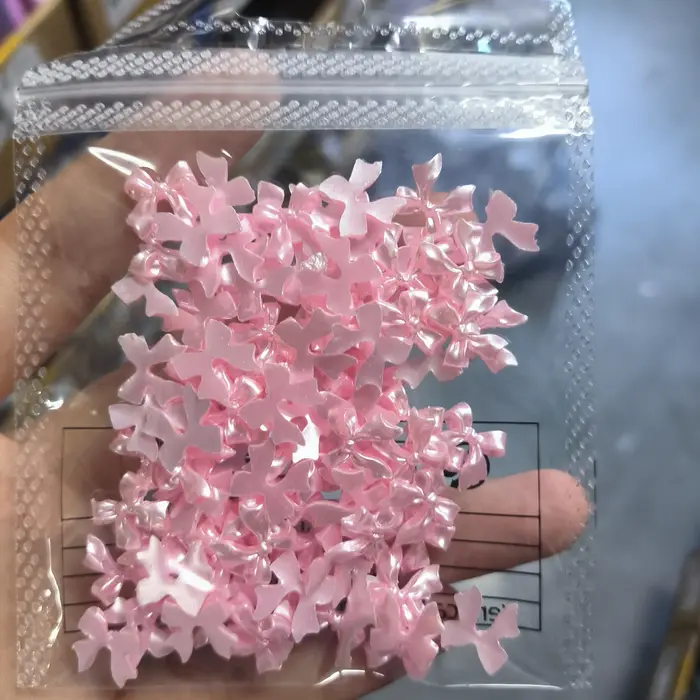 Breloques pour ongles en ruban nacré rose 3D