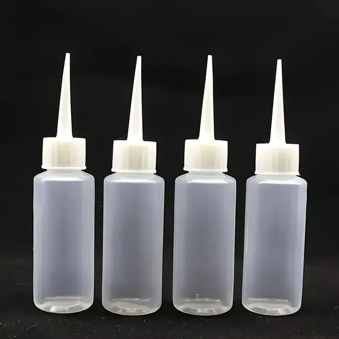 Lot de 4 flacons souples anti-fuite avec embouts de précision