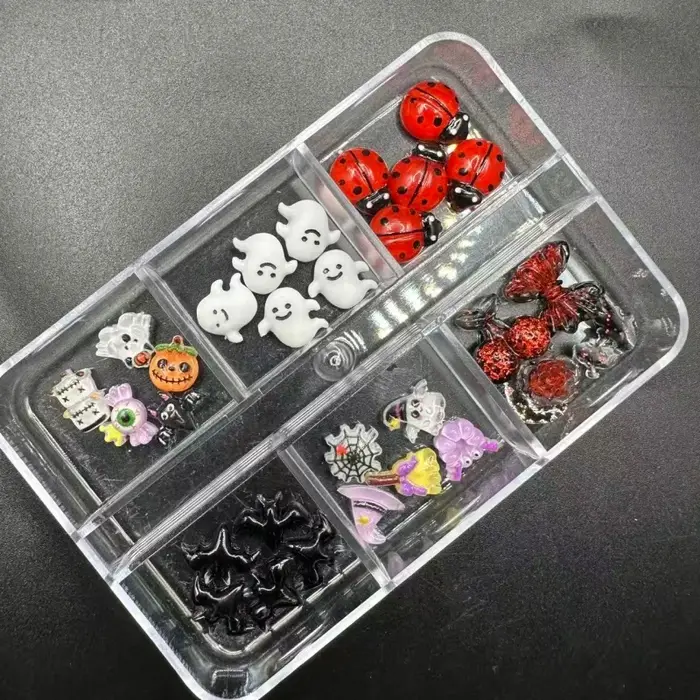 1 boîte de breloques en résine pour Nail Art