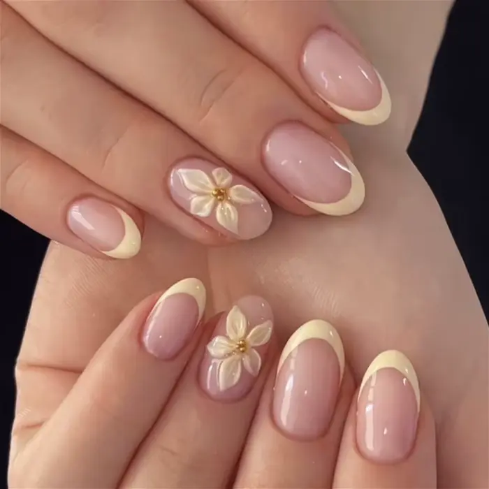 Faux ongles amande jaunes à fleurs roses 3D