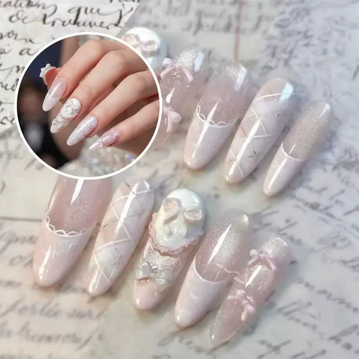 Faux ongles rose poudré avec nœud