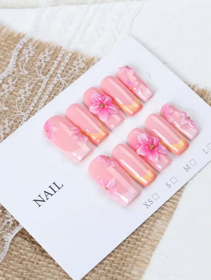 10 faux ongles à presser de style français, de longueur moyenne, rectangulaires, dégradé rose nude et orange, style féminin doux et pur, faits à la main, avec fleurs roses en relief en trois dimension