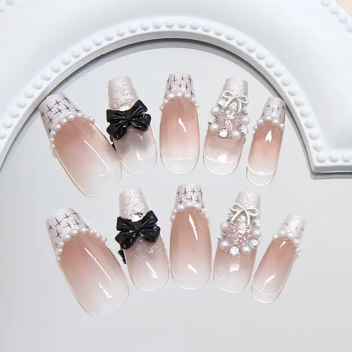 Faux ongles à presser tissés