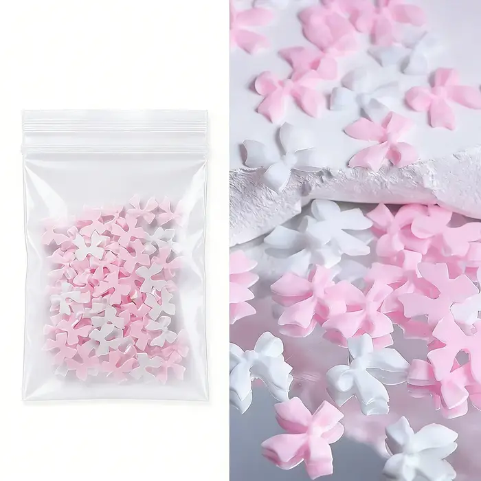 Breloques pour ongles avec nœud en ruban rose et blanc