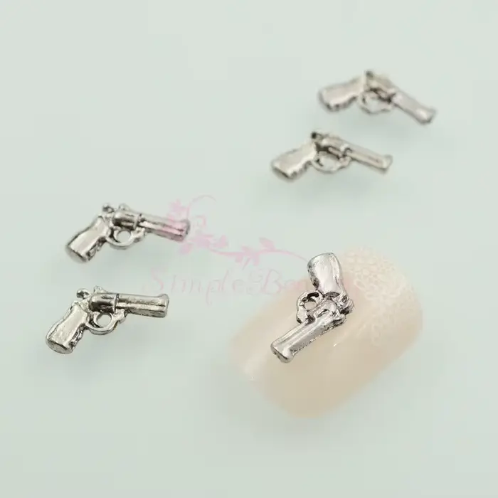 100 PCS/LOT 8x12mm forme de pistolet conception gothique Punk Rock alliage 3D Nail Art Scrapbook artisanat fabrication de bijoux bricolage accessoires de décoration
