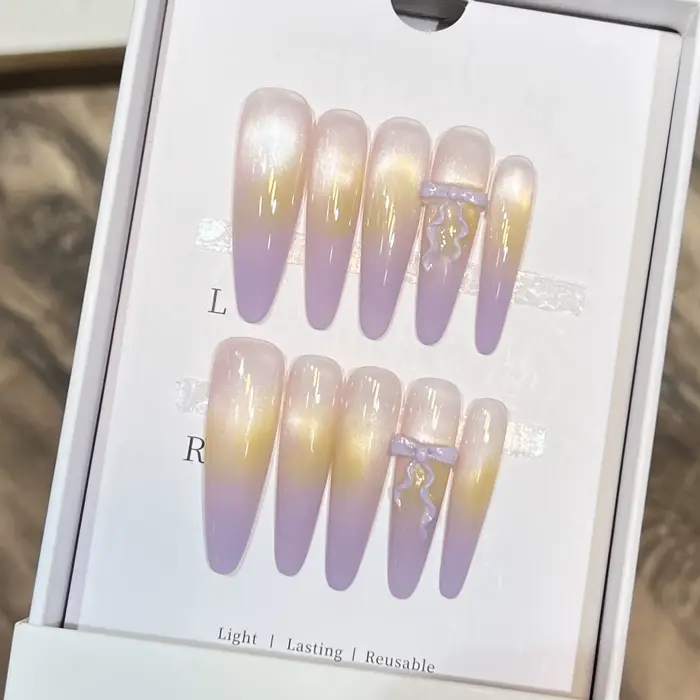Faux ongles œil de chat avec nœud papillon en résine