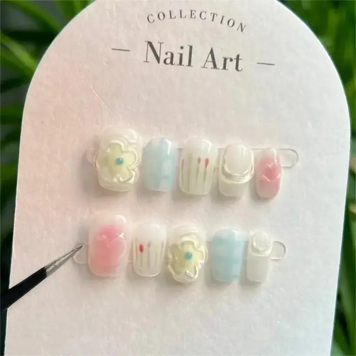 Fleur de printemps mignon courte à la main presse sur les ongles dopamine