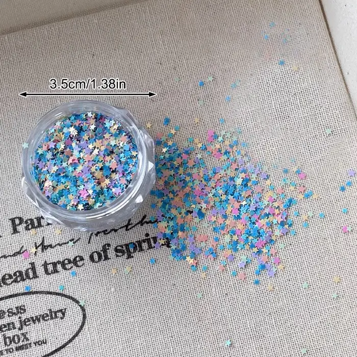 1 boîte de paillettes pour ongles en forme d'étoile