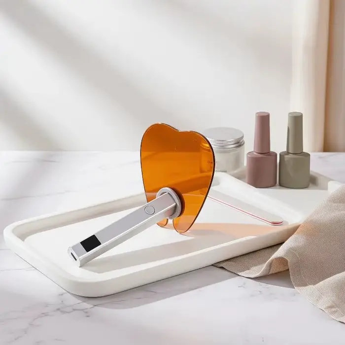 Plaque de protection pour lampe à ongles