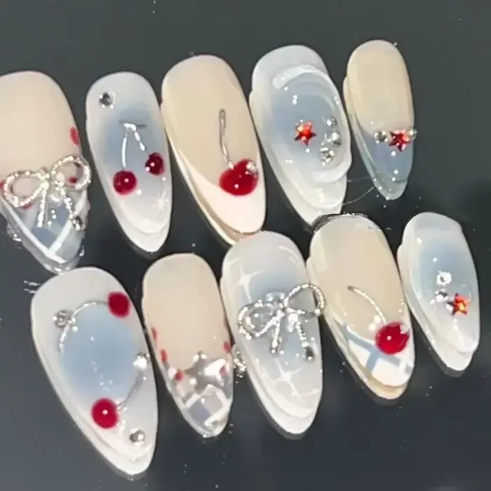 10 pièces presse à la main sur les ongles français amande couverture complète cerises et nœud conception faux