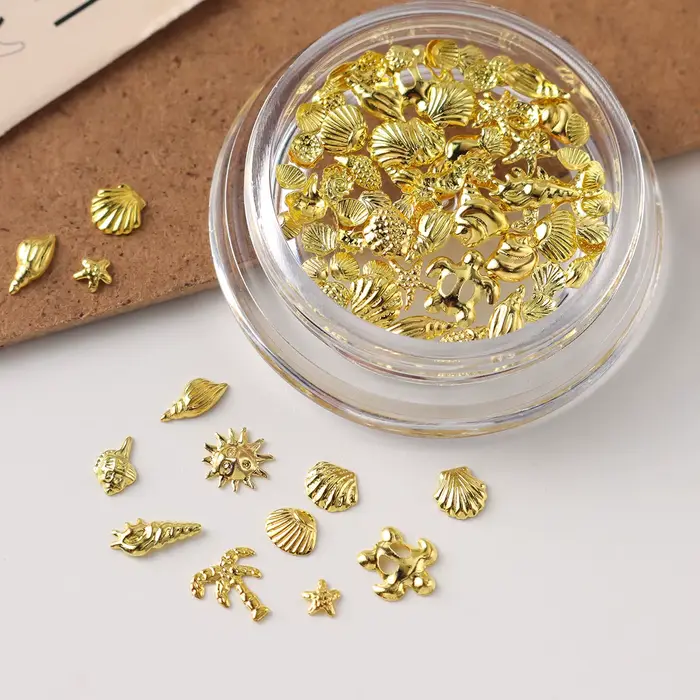 1 Boîte de Décorations Métalliques pour Ongles Thème Océan Doré – Coquillages
