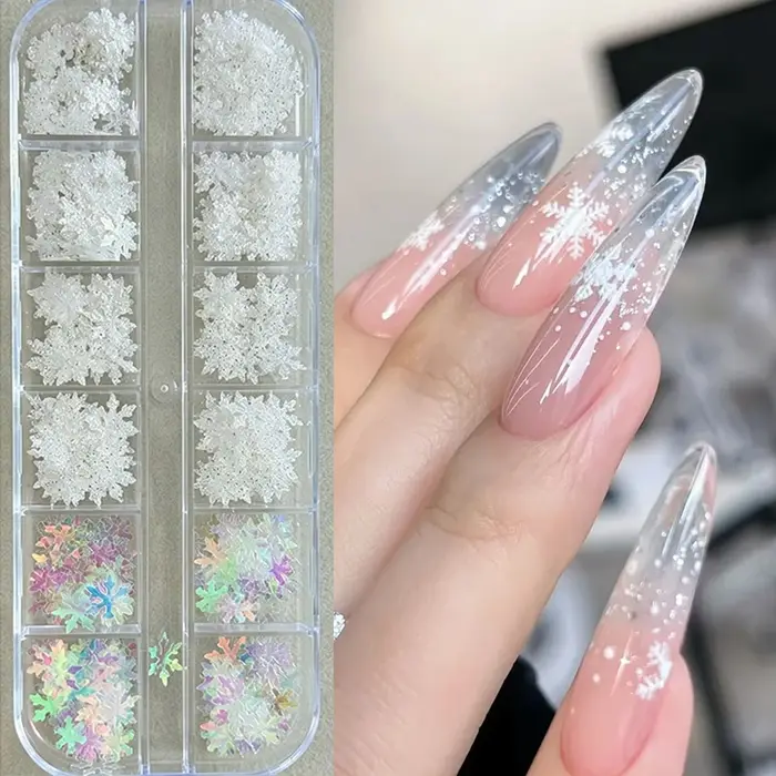 12 grilles de paillettes et décorations pour ongles en forme de flocons de neige variés, avec des tranches de paillettes blanches et des flocons de neige d'hiver, pour la décoration DIY des ongles de