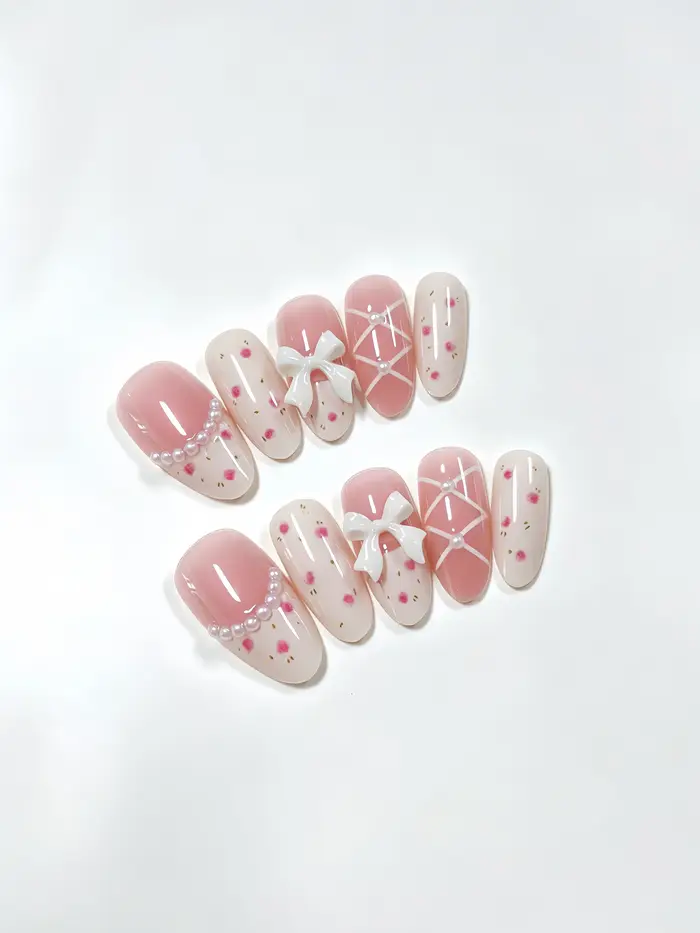 Lot de 10 faux ongles en forme d'amande, dégradé rose nude, mini fleurs roses peintes à la main, nœud papillon blanc 3D, faits à la main, exquis, longueur moyenne, style coréen, style Ins, style délic