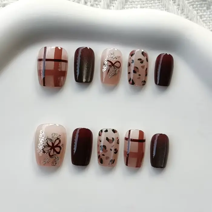 Femmes à la main papillon violet avec diamants conceptions scintillant oeil de chat presse sur les o