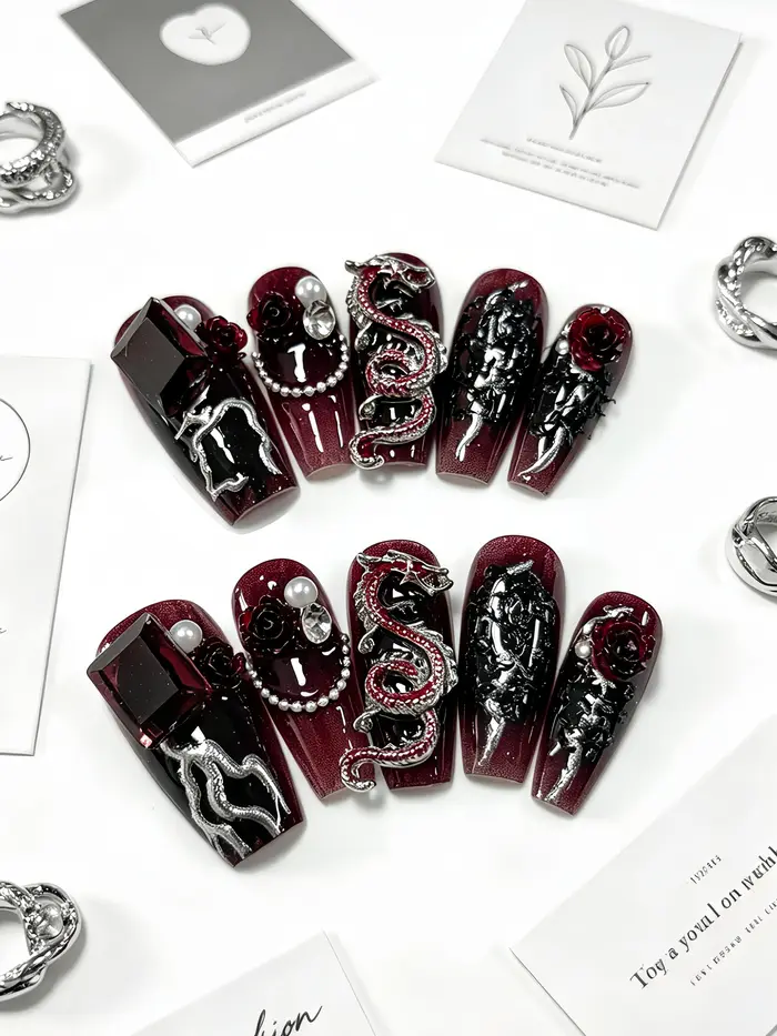 10 faux ongles trapézoïdaux de taille moyenne, dégradé noir et rouge effet œil de chat, avec motif d