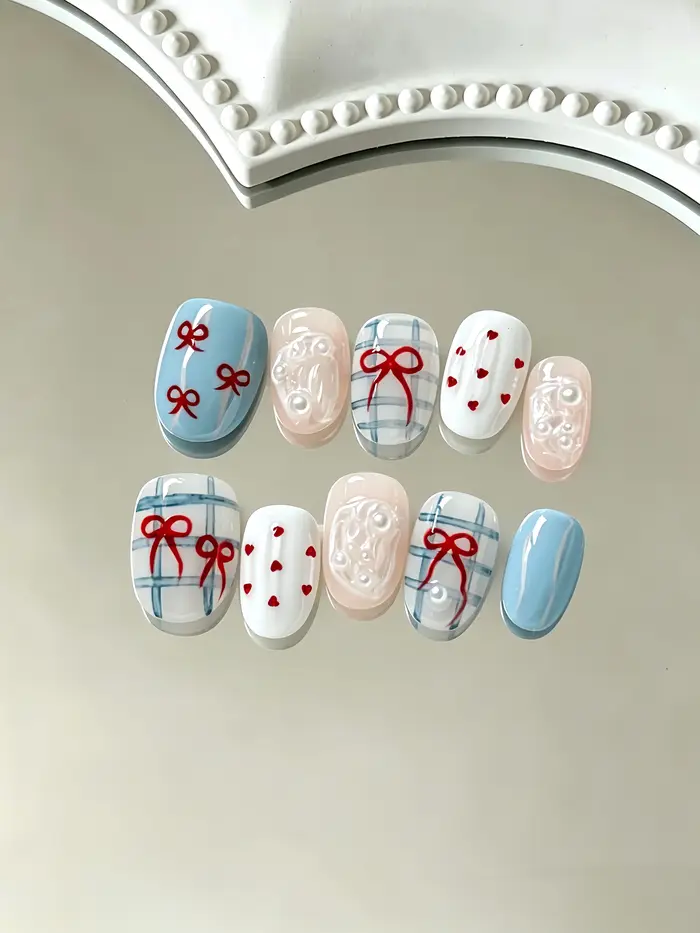 10 pièces d'ongles courts de forme ovale, motif à carreaux bleus et nœud rouge, style coréen, ongles