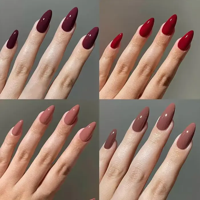 96 ongles en amande faits à la main. Couleur unie en 4 tons : rouge bordeaux, rouge vif, beige nude 