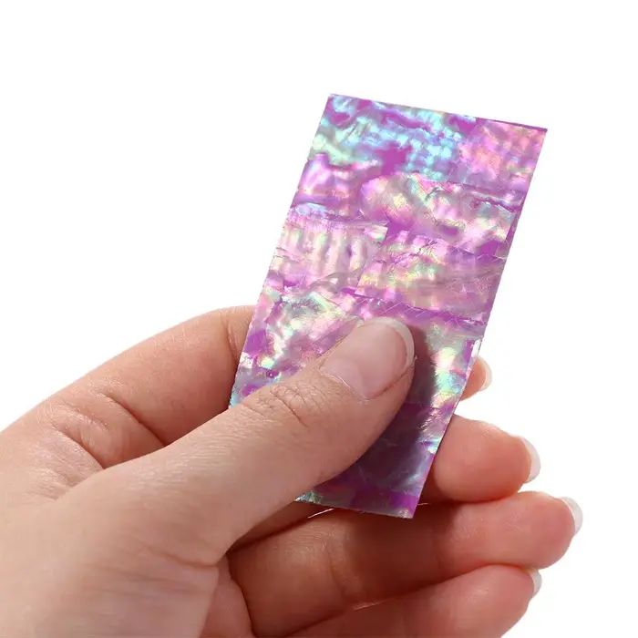 Feuilles autocollantes colorées pour les ongles