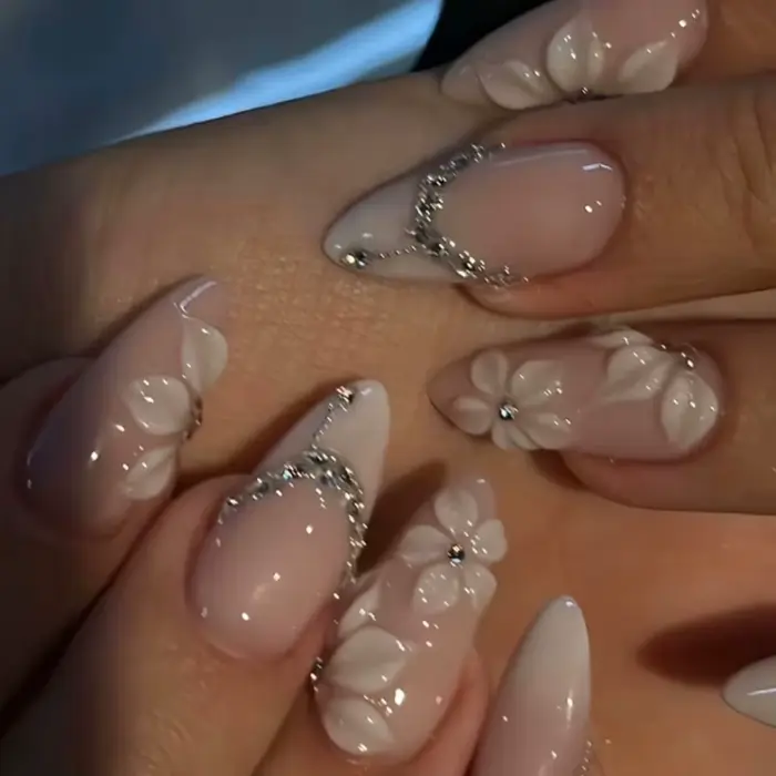 Faux ongles amande jaunes à fleurs roses 3D