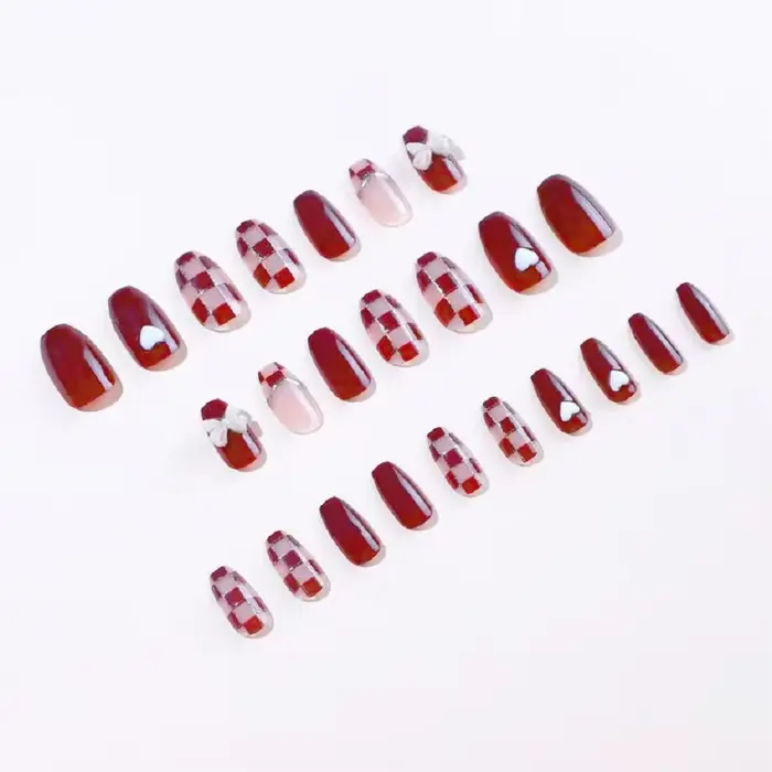 24 pièces/1 boîte faux ongles en damier en poudre d'or avec nœud rouge