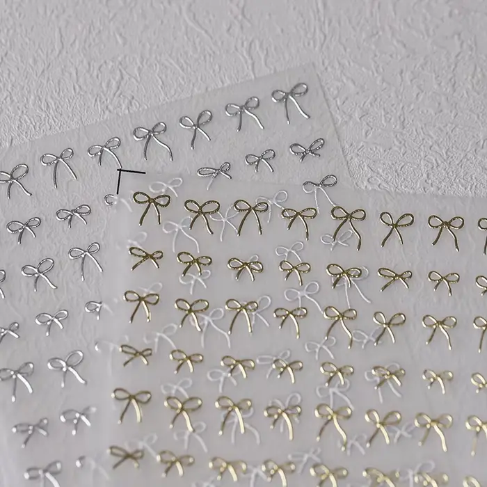 Autocollants 3D Adorables Dorés Argentés Blancs à Nœuds Papillon pour Ongles