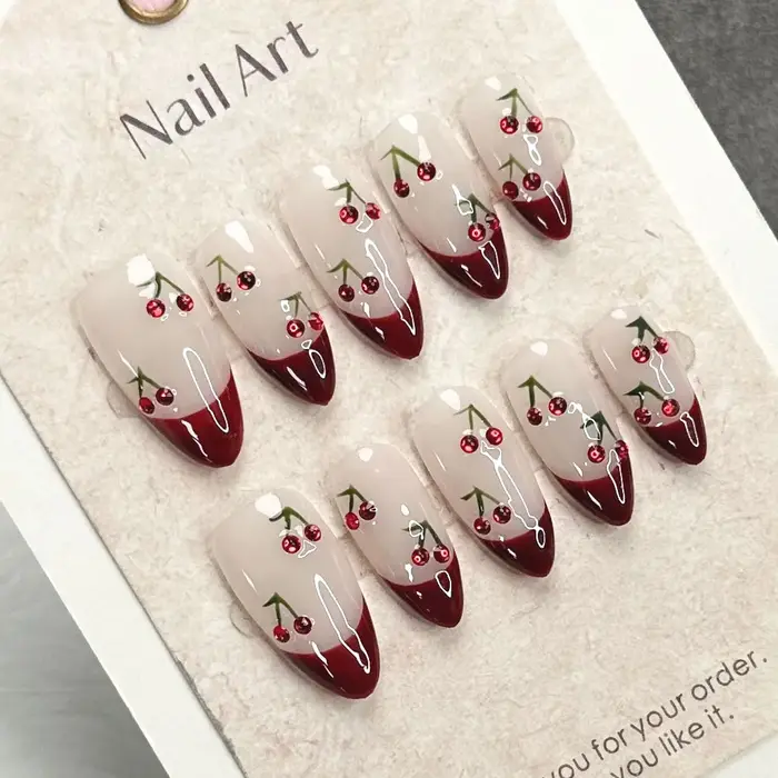 10 pièces presse à la main sur les ongles français amande couverture complète cerises et nœud conception faux