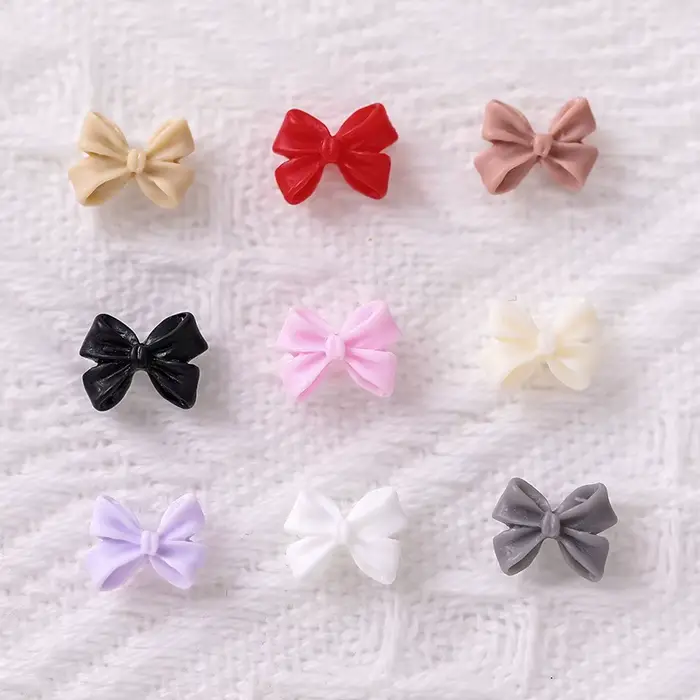 50/100 pièces rose blanc Kawaii arc breloque pour ongles 3D résine nœud papillon Flatback ongles gem