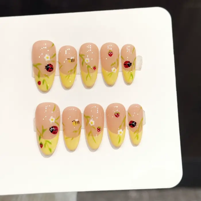 10 faux ongles press-on faits main, motif printanier, jaunes, forme amande, avec motifs coccinelle, 