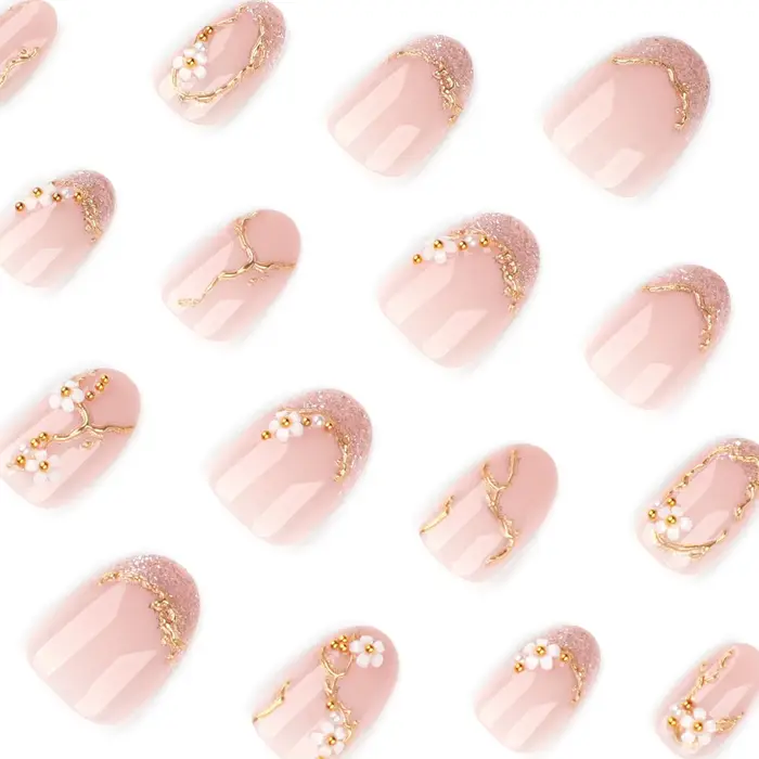 Faux ongles à presser courts en amande rose avec motifs floraux 3D