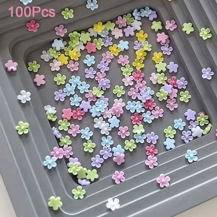 100 pièces de fleurs en résine colorées (frangipanier, lys, camélia) pour décorations d'ongles, brel