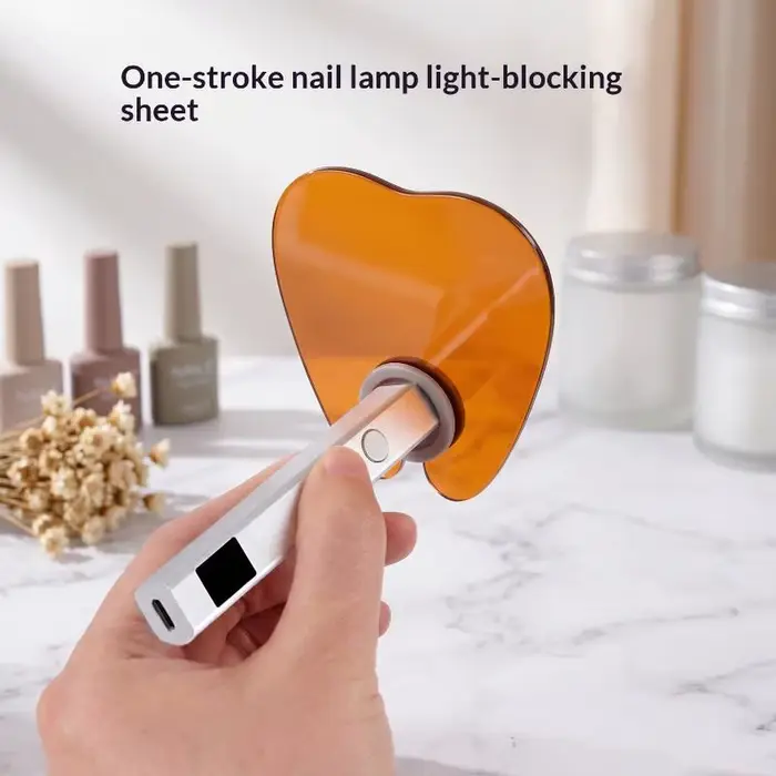 Plaque de protection pour lampe à ongles
