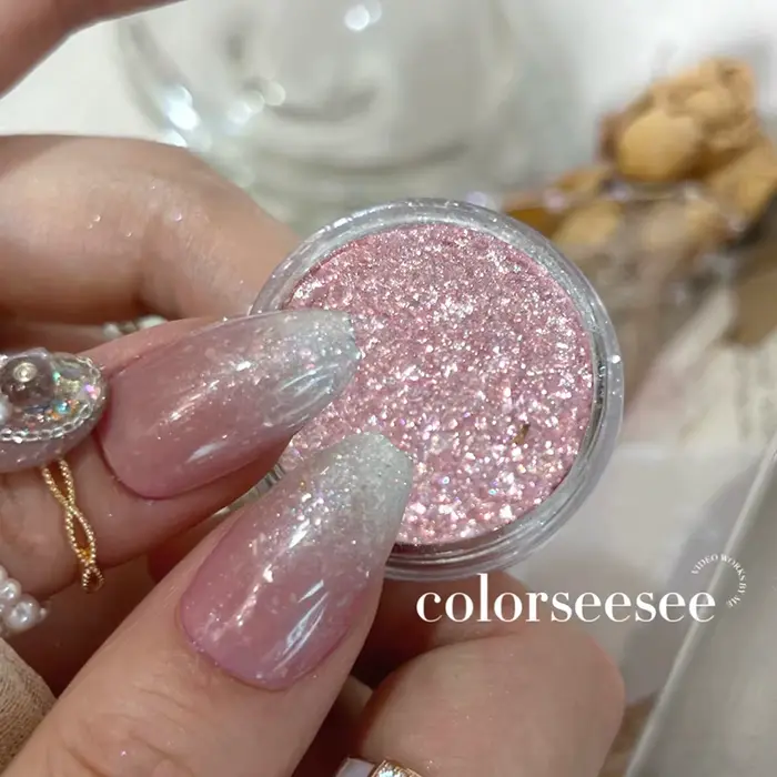 Poudre à paillettes rose scintillante pour ongles
