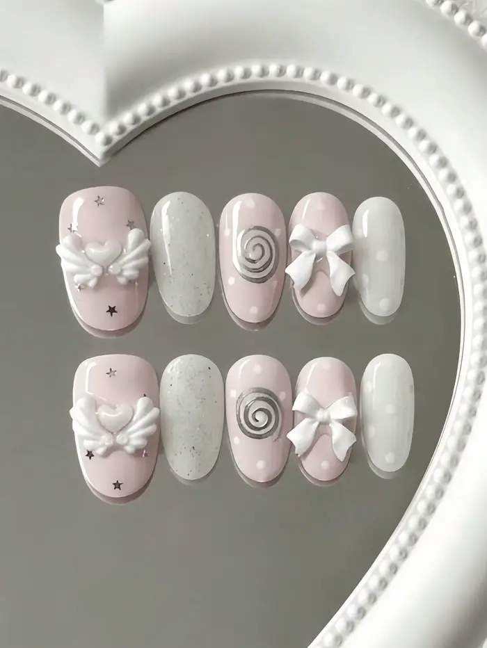 10 faux ongles courts roses et blancs à thème ange, style doux et mignon, avec des ailes d'ange 3D,