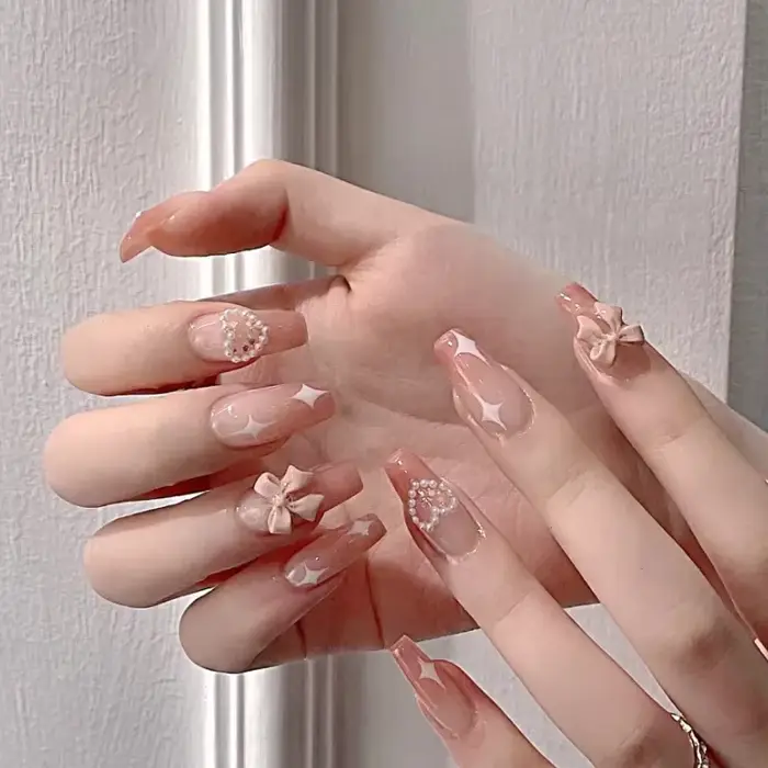 Faux ongles roses à pression