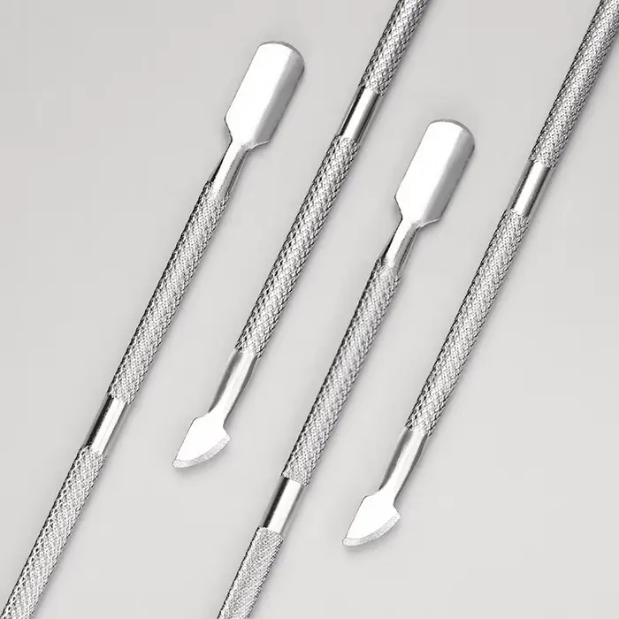 Poussoir à cuticules à Double extrémité en acier inoxydable, dissolvant de peau morte pour pédicure 