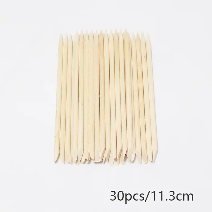 Bâtonnets en bois d'oranger pour repousser les cuticules