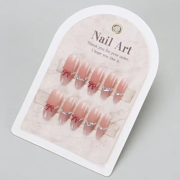 24 faux ongles nude effet œil de chat avec motifs