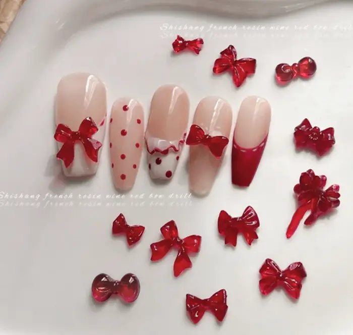 Accessoire de Nail Art avec nœud rouge vin doux