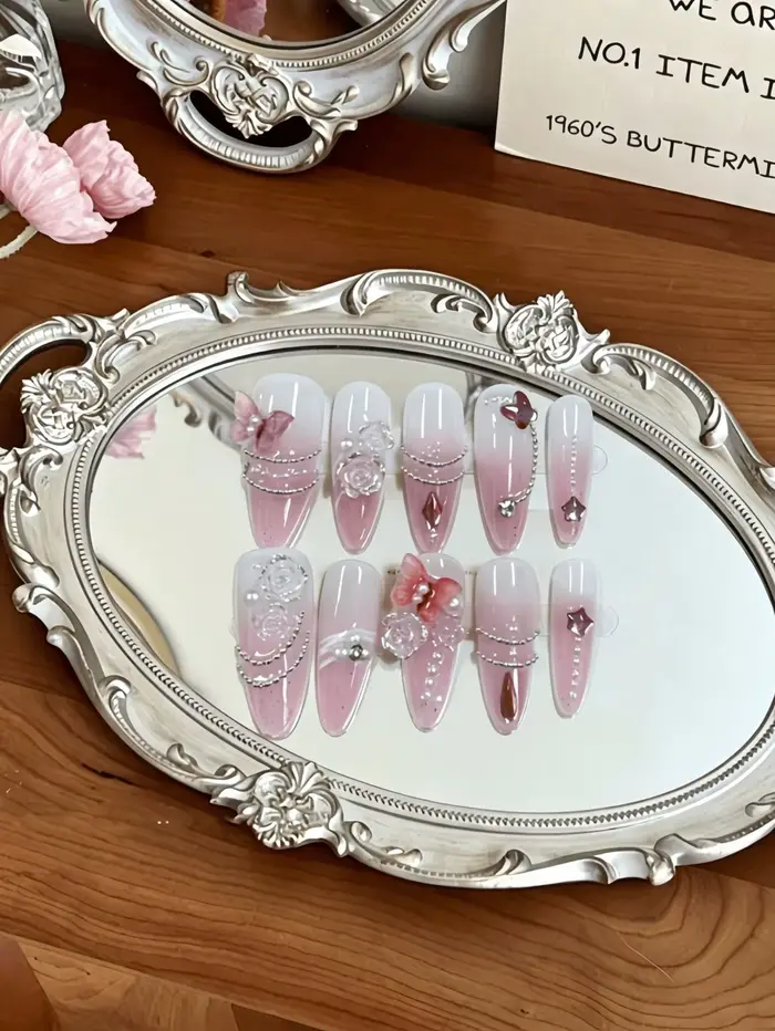 10 faux ongles en forme d'amande, longueur moyenne, avec dégradé rose et blanc, roses peintes à la m